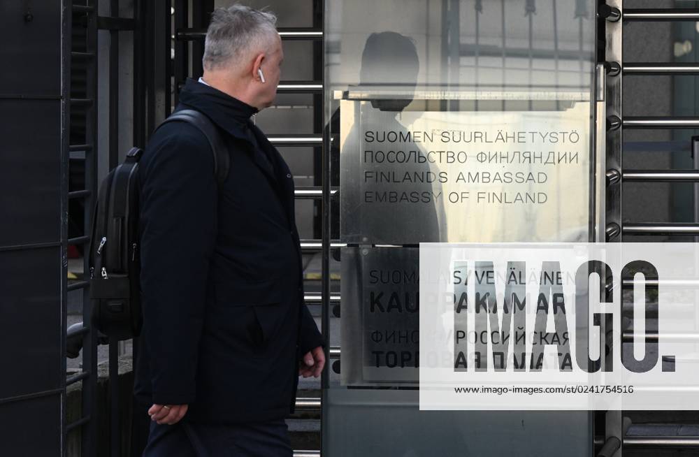 Russia Finland NATO Accession 8405100  A woman walks past the  embassy of Finland in