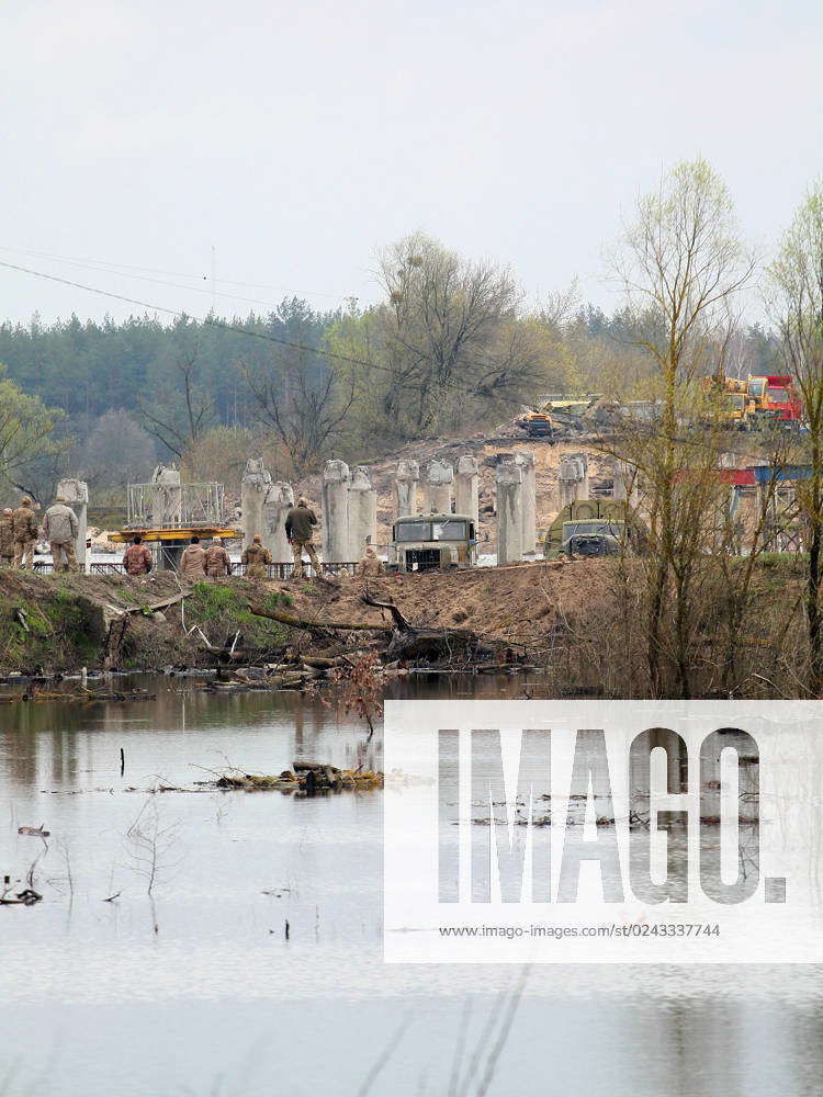 IVANKIV, UKRAINE - A pontoon bridge is being constructed in Ivankiv ...