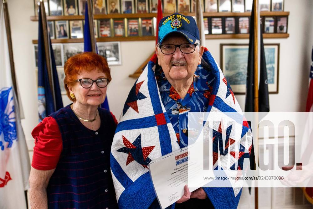 Syndication Adrian VanHouten stands with his wife