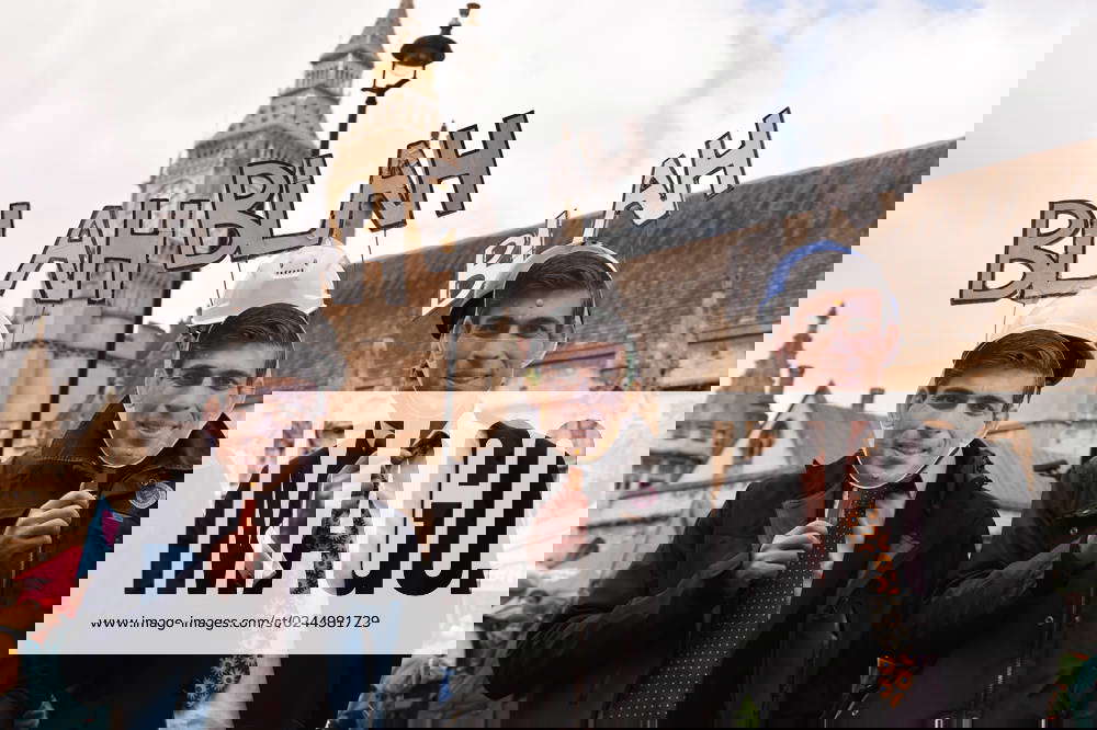 April 21, 2023, London, England, United Kingdom Protesters in Rishi Sunak masks pose outside UK Par