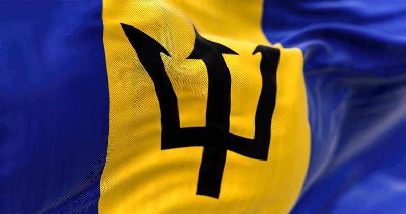 Close-up view of the Barbados national flag waving in the wind Close-up ...