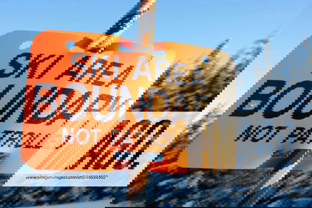 A sign warns skiers and snowboarders that the are they are about to