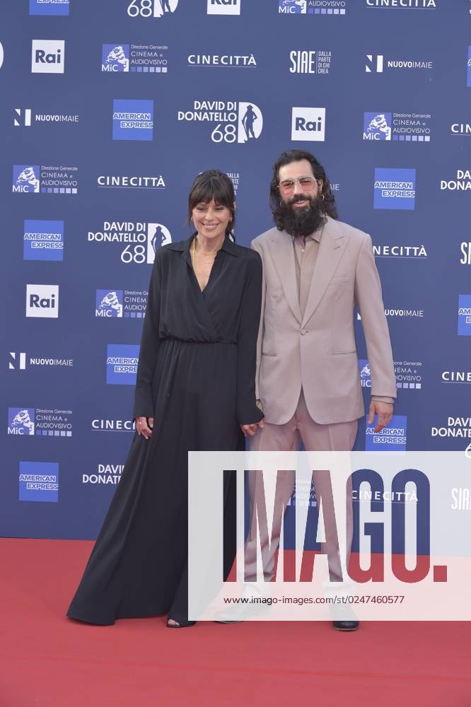 The Italian actress Claudia Pandolfi and her husband during the red carpet  for the award ceremony