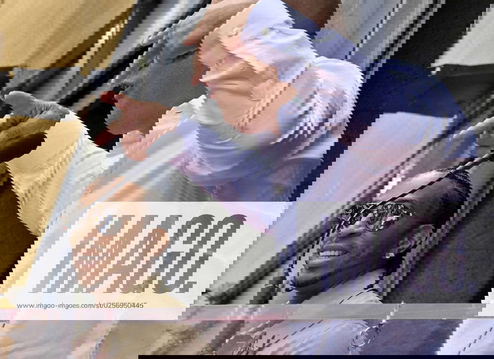 Award winning rapper and actor Ludacris (L) reacts to comments by actor ...