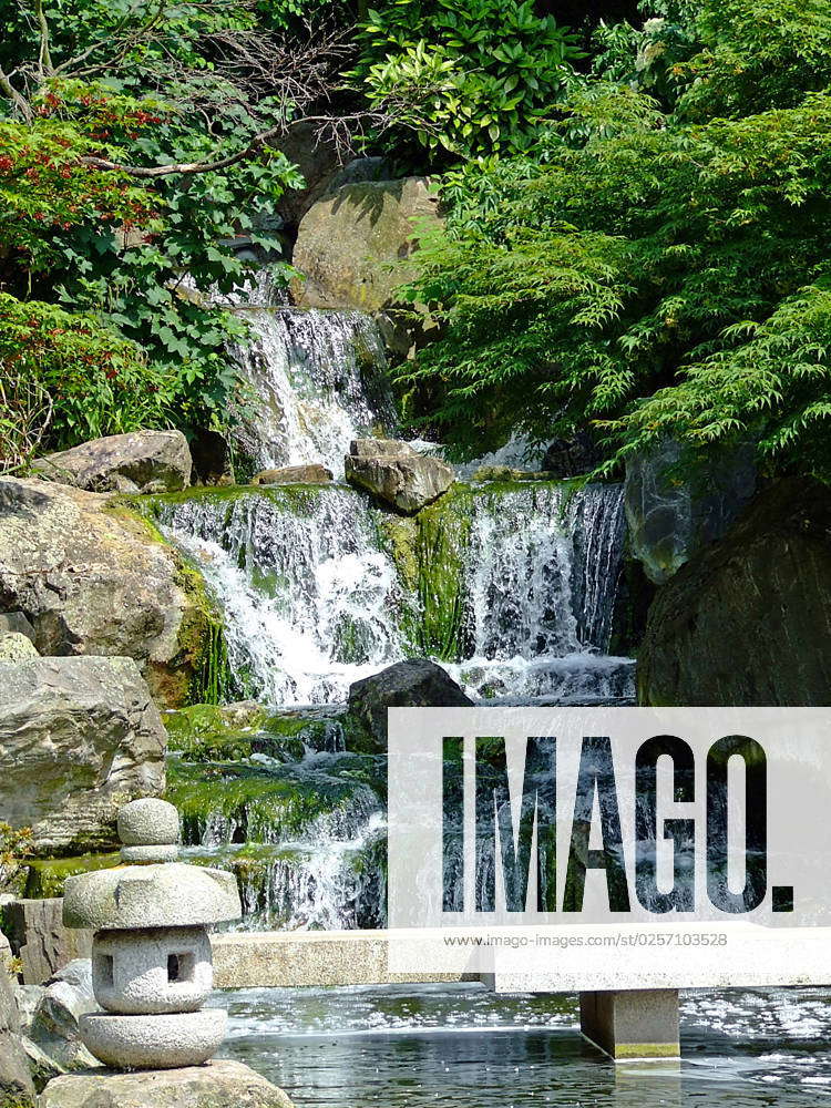 Traditional Japanese Kyoto gardens with big waterfalls