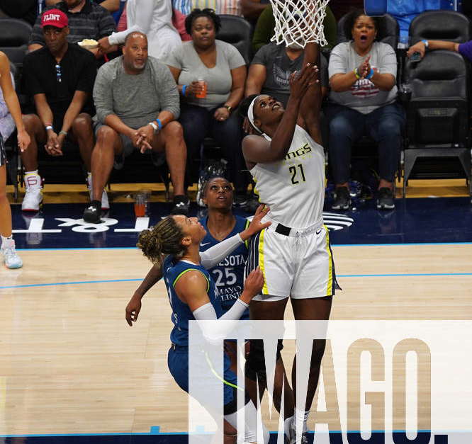 Kalani Brown goes for the left-handed layup during the WNBA game ...