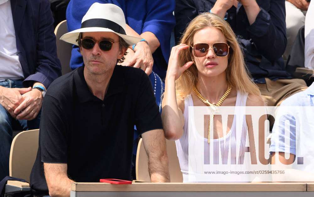 Antoine Arnault and Natalia Vodianova with her son attend the third round  of the French Tennis