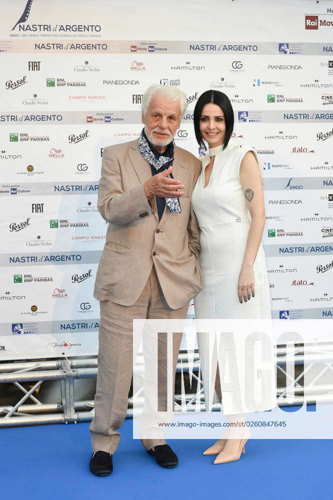 Italian actor and director Michele Placido and his wife Federica