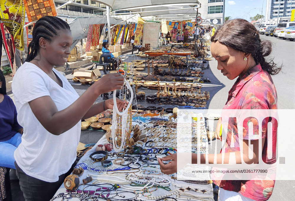 230627) -- WINDHOEK, June 27, 2023 -- A woman sells artistic items