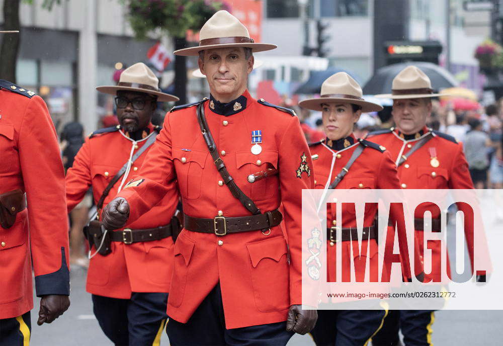 Canadian Rcmpcert Montreal, PQ, Canada: Members of the RCMP during a Canada Day parade in ...