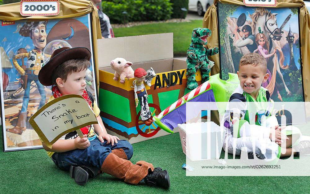 Syndication: The Patriot Ledger Kids on a Disney themed float dressed ...