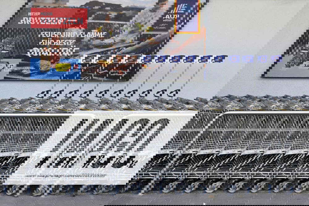 Aldi shopping cart and advertising poster, Switzerland