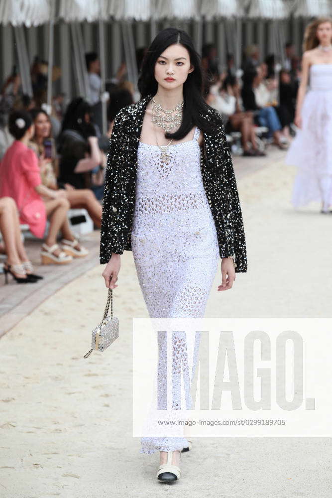 A model walks the runway during Chanel Cruise Collection 2022-23