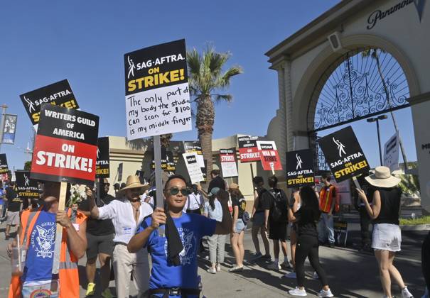 Members of the SAG-AFTRA actors union join writers on the picket lines ...