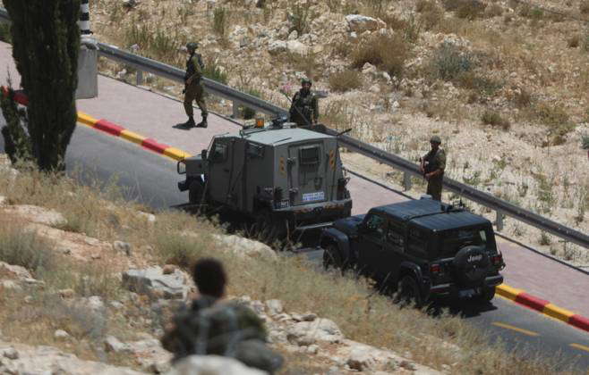 (230716) -- BETHLEHEM, July 16, 2023 -- Israeli soldiers are seen near ...