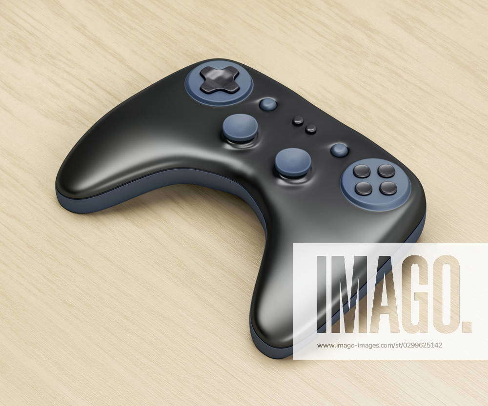 Black game controller Wireless game controller on wooden