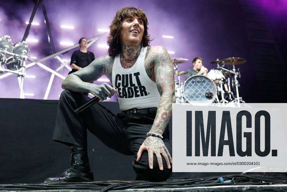 July 25, 2023, Tampa, Florida, USA: Oliver Sykes, of Bring Me The Horizon,  talks to the