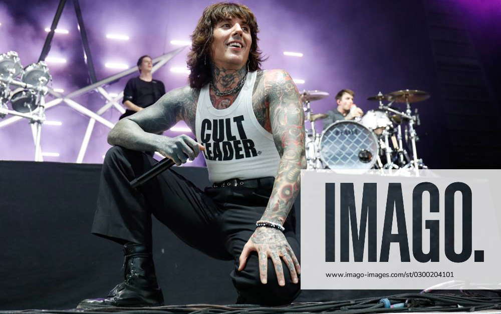 July 25, 2023, Tampa, Florida, USA: Oliver Sykes, of Bring Me The Horizon,  talks to the