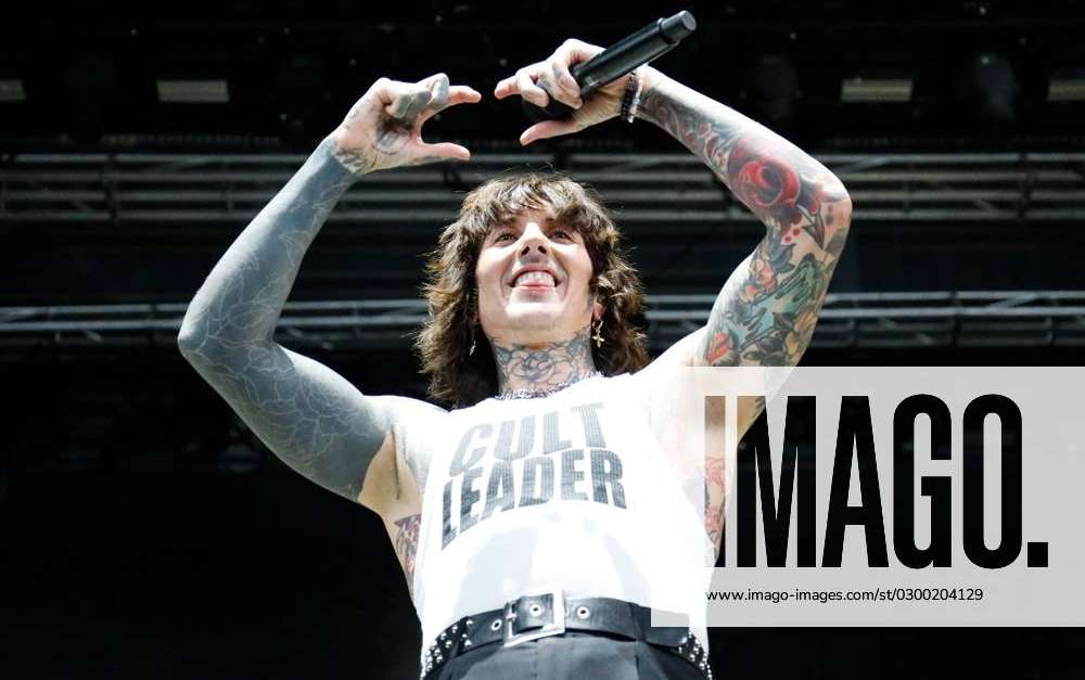 July 25, 2023, Tampa, Florida, USA: Oliver Sykes, of Bring Me The Horizon,  talks to the