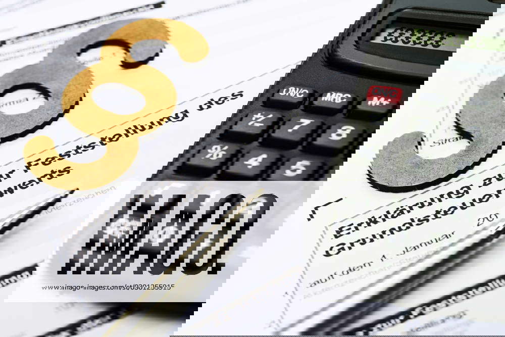 Property tax declaration with paragraph sign and calculator, symbol