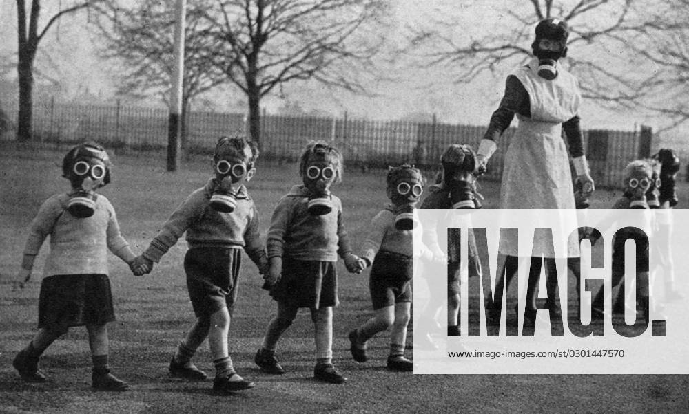 Evacuee children in gas masks near Windsor, 1941 London babies find