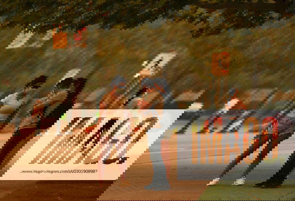 August 18, 2023, KELOWNA, BC, CANADA People wear masks due to poor air