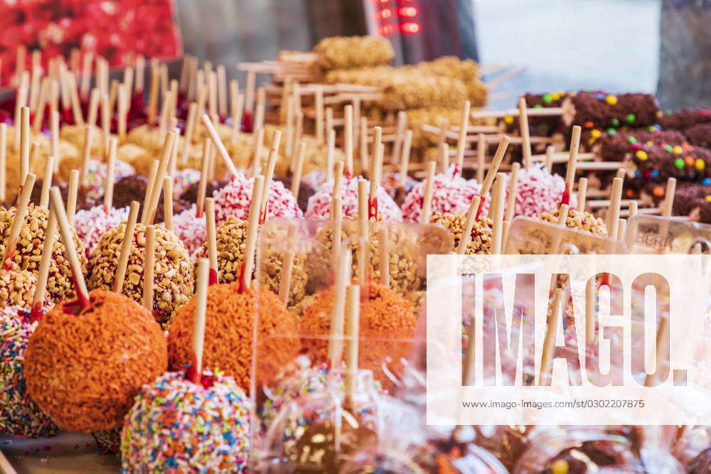 Coney Island, Brooklyn, New York, USA. Multicolored candied apples for