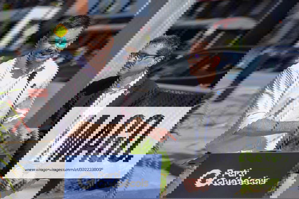 August 24, 2023, Quebec City, PQ, CANADA PQ leader Paul StPierre Plamondon, left, talks to the