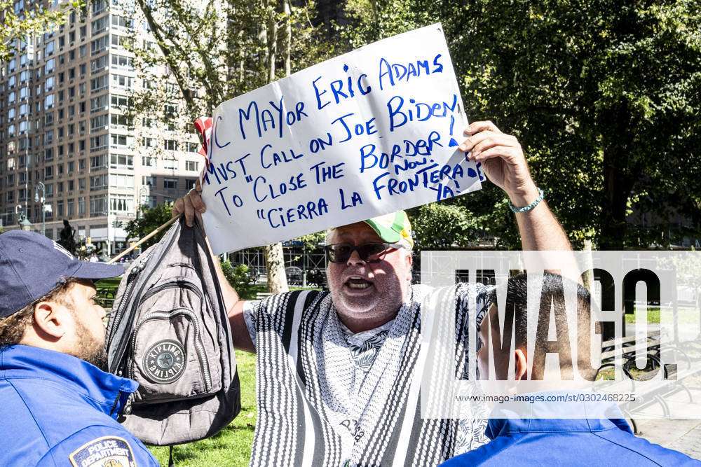 New York City, United States. 13th Aug, 2023. A man holding a sign