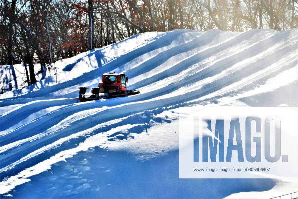 An employee operates a groomer on a hill Jan. 26, 2023, at Whitetail ...