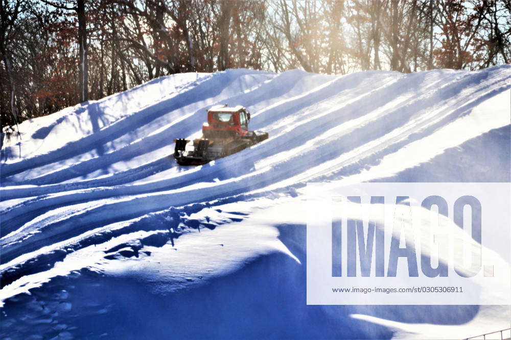 An employee operates a groomer on a hill Jan. 26, 2023, at Whitetail ...