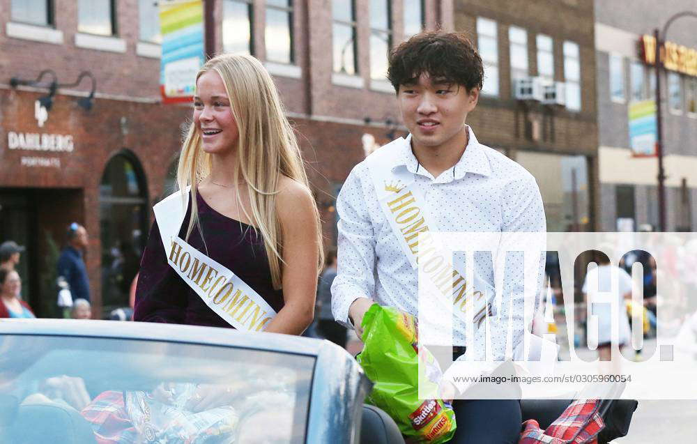Syndication: The Ames Tribune Ames High Homecoming Court Jude Spillers and  Justin Shin pass through