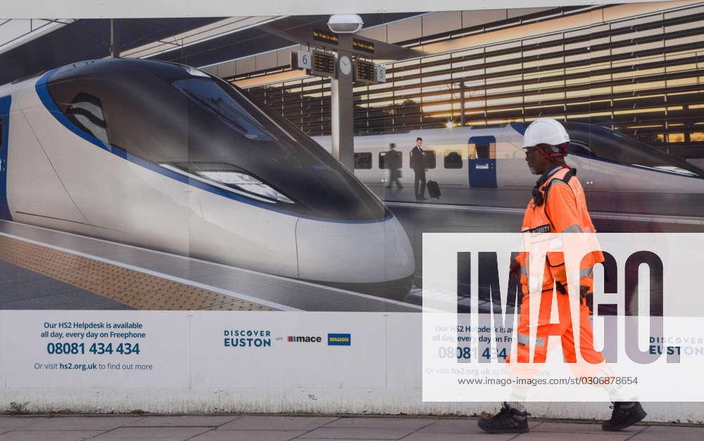 October 3, 2023, London, England, UK: A worker walks past the HS2 ...