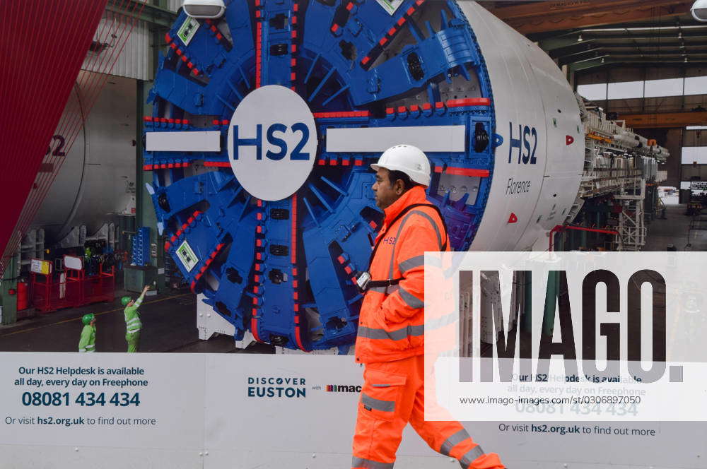 October 3, 2023, London, England, UK: A worker walks past the HS2 ...