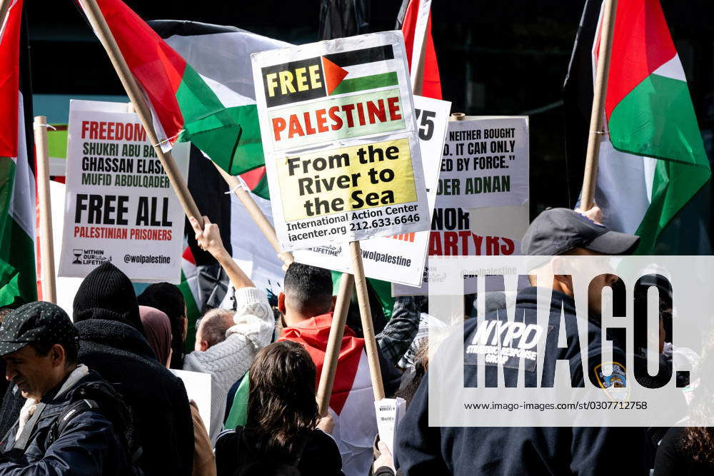 Pro Hamas Rally in New York City - 09 Oct 2023 Protesters hold flags ...