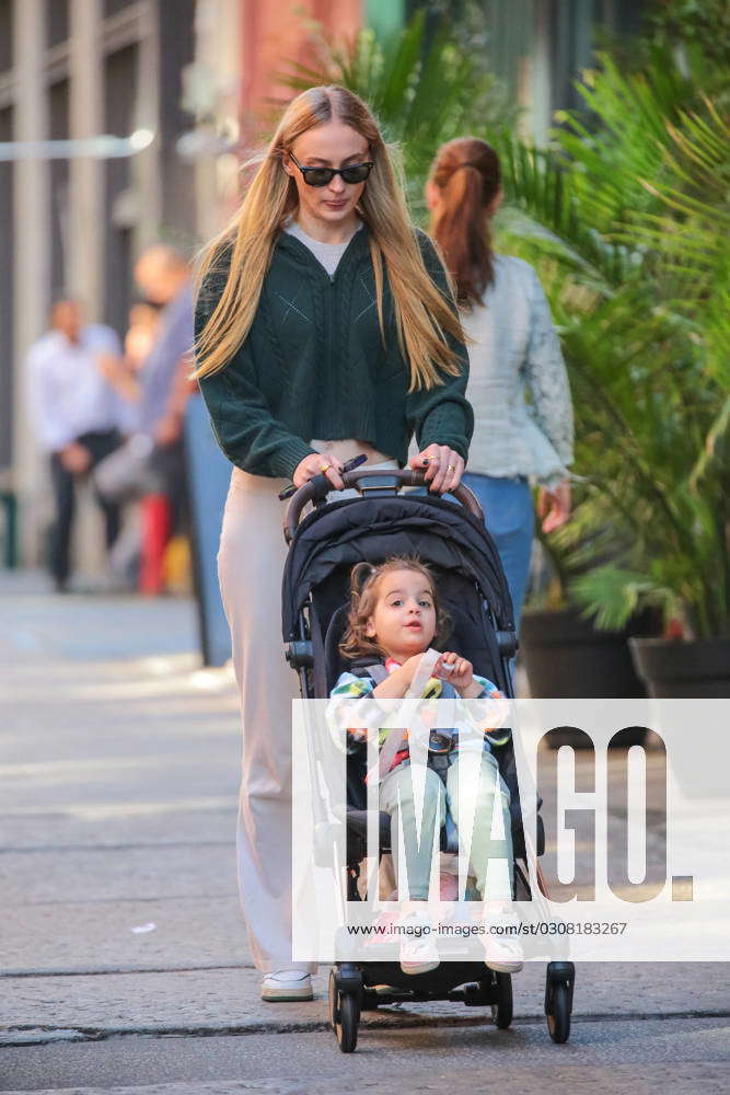 Sophie Turner and her daughter Willa out for a stroll in the city