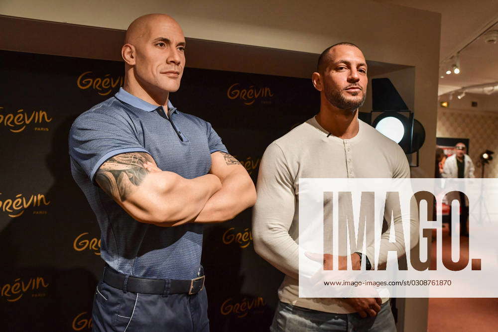 The Rock waxwork statue unveiled and fans think it looks more like  'darts-playing bouncer' than WWE legend | The US Sun