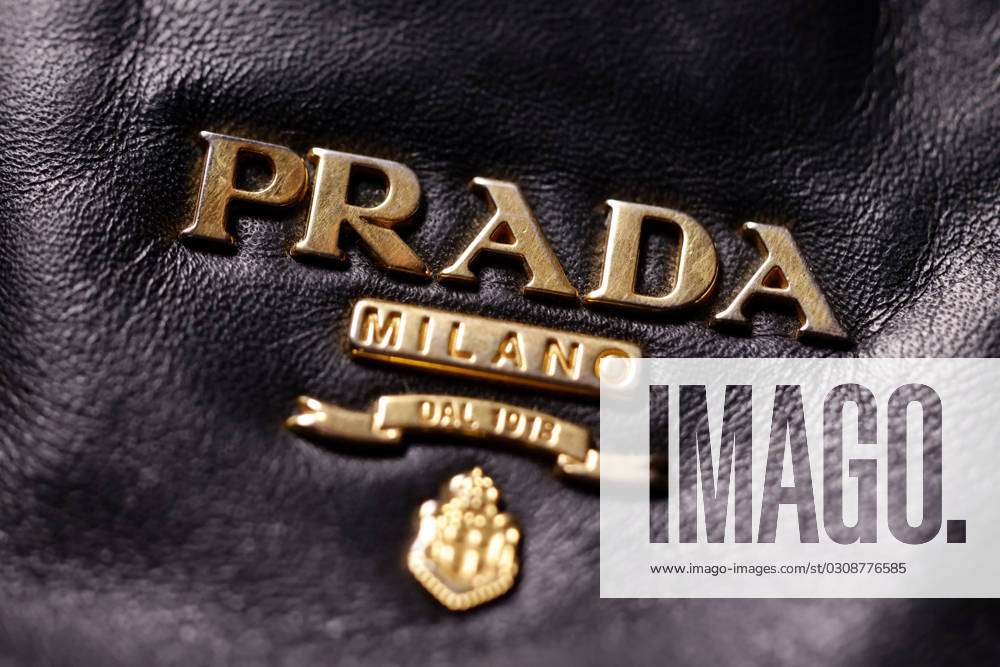 Prada Logo Plaque Shoulder Bag, $1,712 | farfetch.com | Lookastic