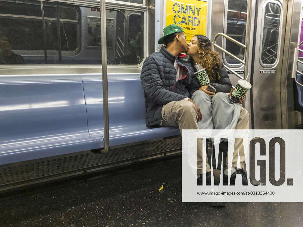 Subway ridership in New York Public display of affection on the E train ...