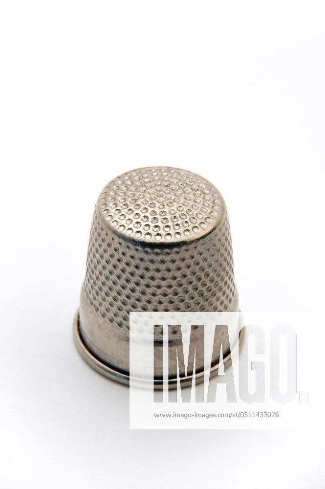 Metal finger cover used to protect fingers while sewing , 1387728, sew, stitch, cover, needle