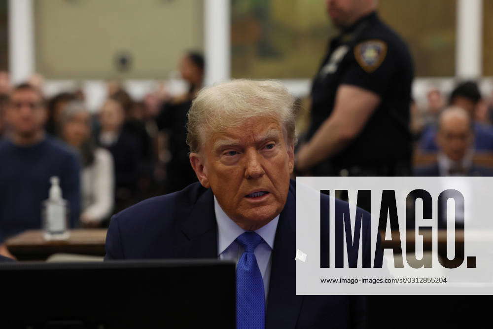 Former United States President Donald Trump Waits In The Courtroom On ...