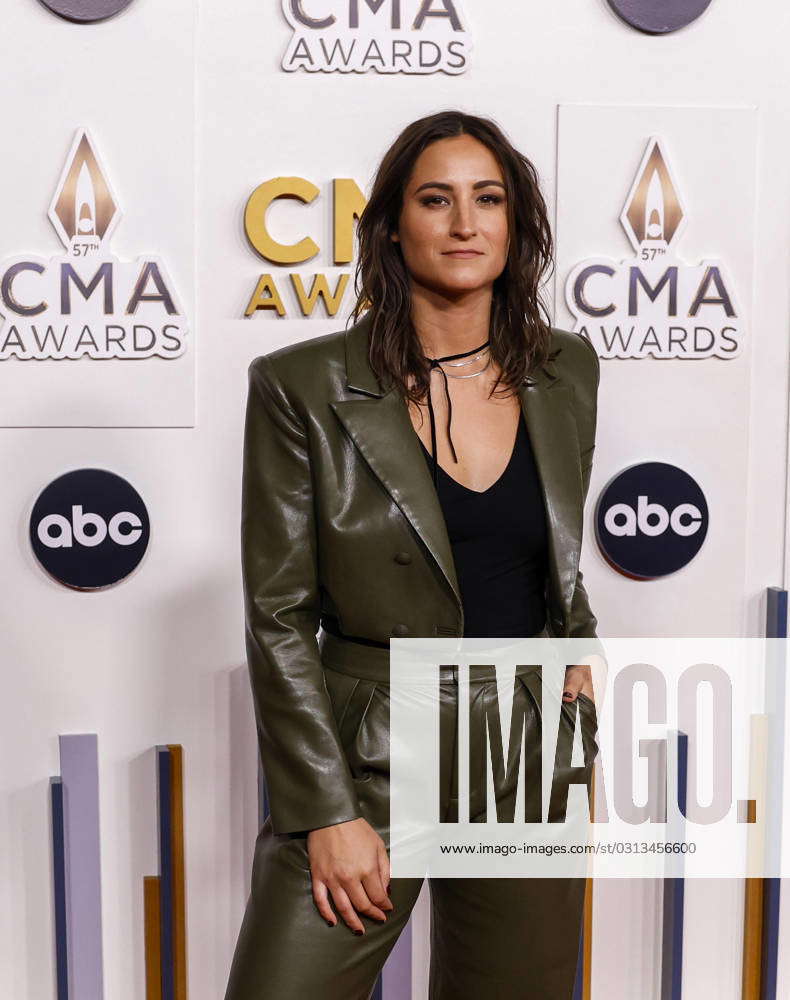 Angie K arrives on the red carpet at the 57th Annual CMA Awards at ...