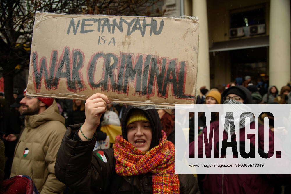 Solidarity With Palestine Rally In Warsaw. A demonstrator holds a sign ...