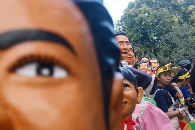 Angono, Rizal, Philippines: A papier-mache statues walks in the street ...