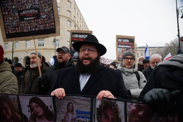 Pro Israel Rally In Warsaw. Hasidic Rabbi Szalom Ber Stambler (c) And 