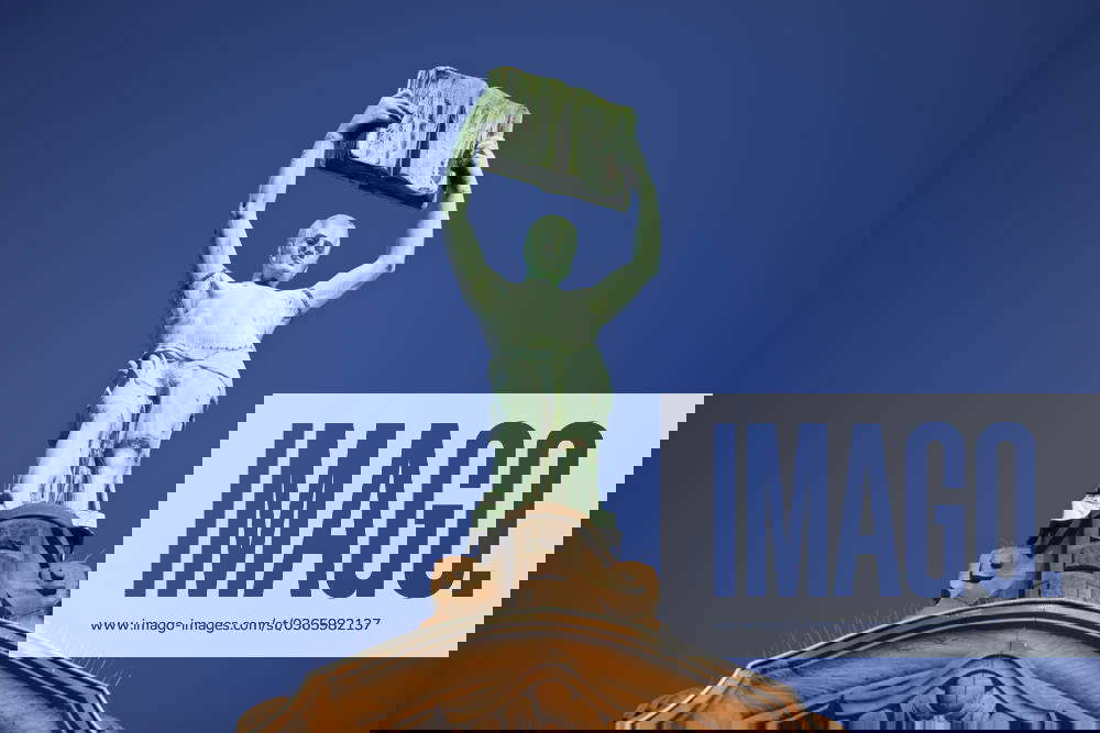 Copper statue with the Title the Knowledge at the Press House Wiesbaden