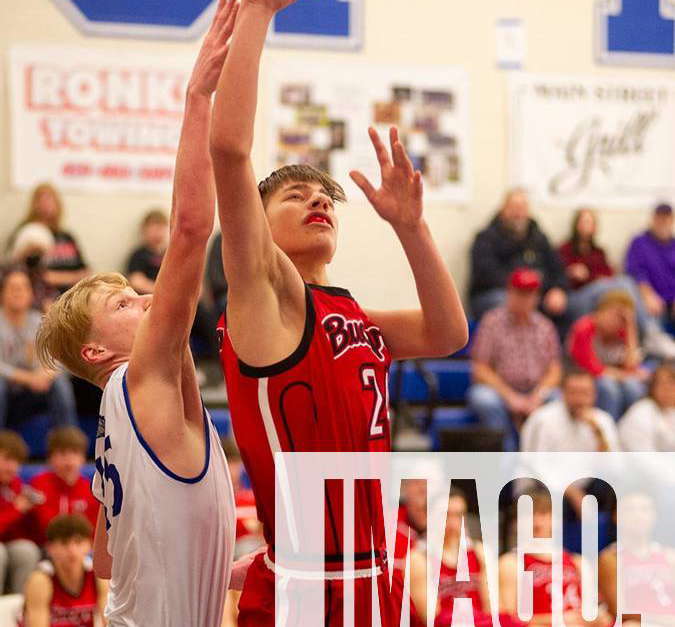 Syndication: Telegraph-Forum, Bucyrus Noah Burke finishes at the basket ...