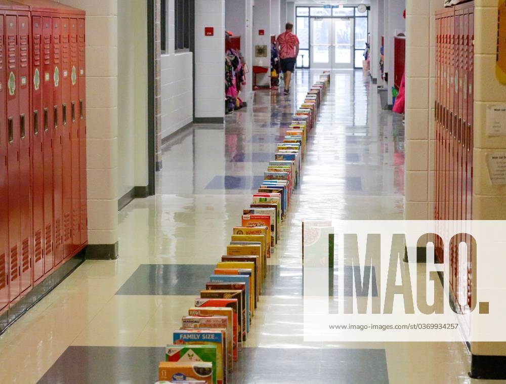 Syndication Sheboygan Press Cereal boxes lined up like dominos at