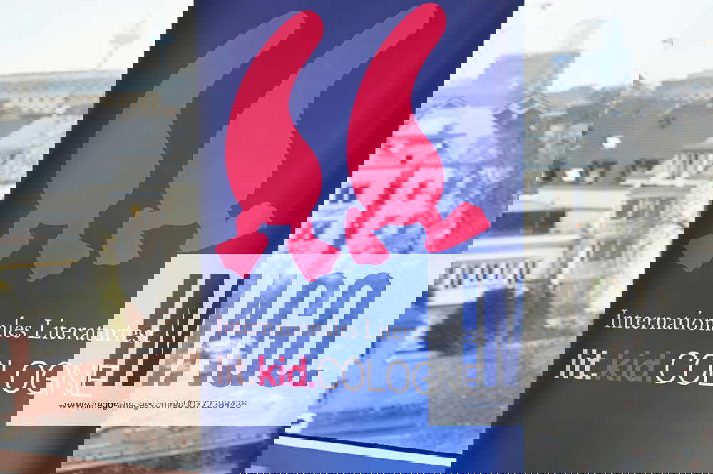 Lit kid Cologne logo and lettering on a stand at the program press