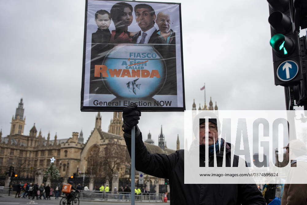 Pro-EU protest in London, UK - 13 Dec 2023 A protester holds a poster ...